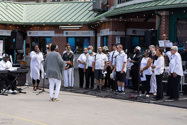 people singing at the annual day of racial healing